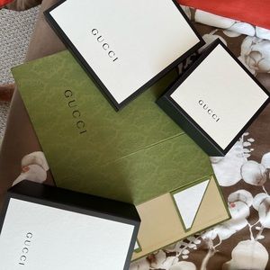 4 new GUCCi gift boxes. Selling individually for 10$ each